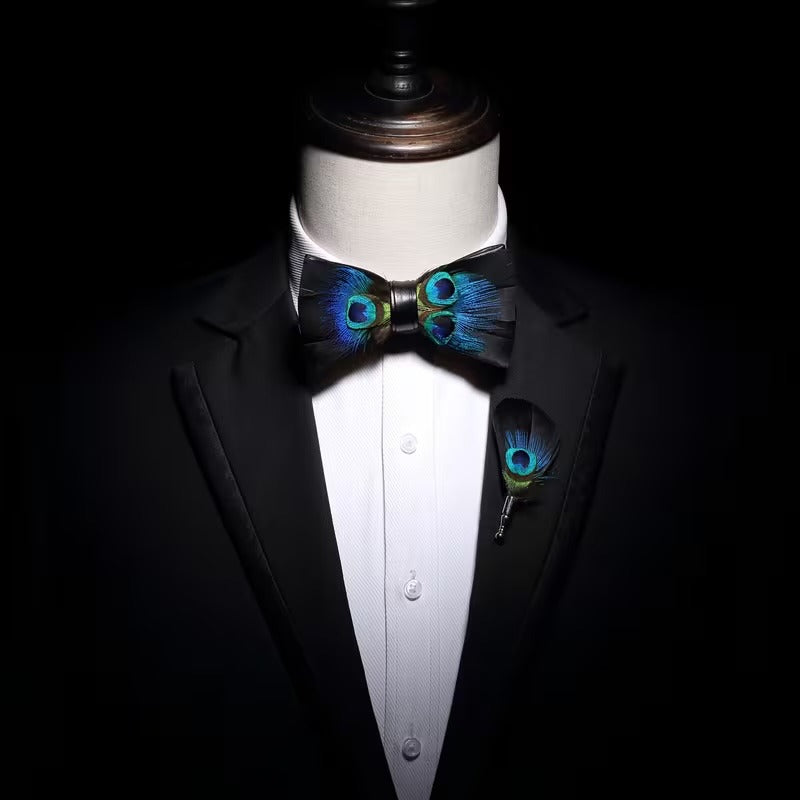 The Peacock Eye bowtie and lapel pin worn with a tuxedo